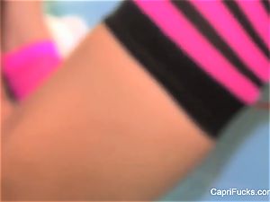 Capri wanks in a wig and striped socks